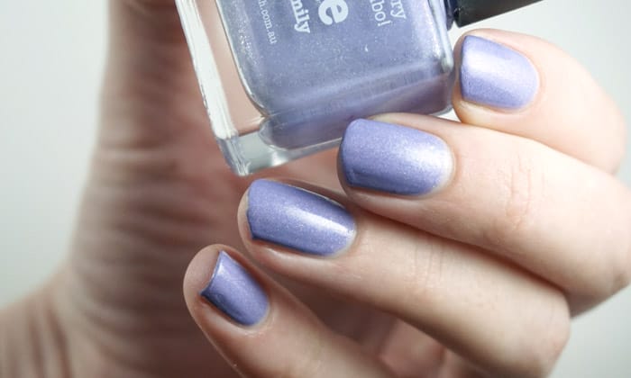 Swatch of Picture polish Eerie, a light purple nail polish with a holographic finish
