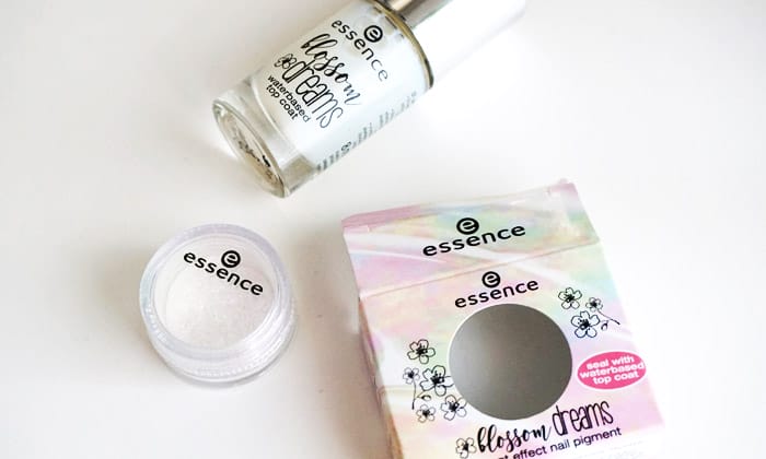 Bottle of Essence blossom dreams waterbased topcoat and effect nail pigment