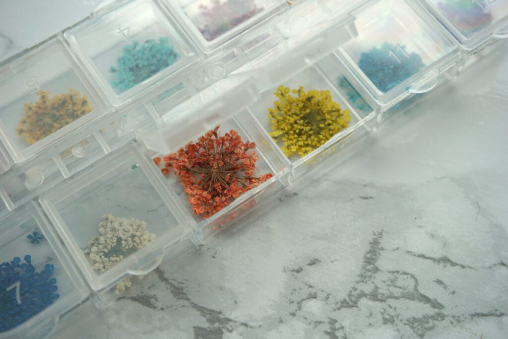 Colored dried flowers that can be used for nail art or with epoxy, They have different bright colors
